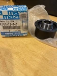 Mazda Part # KJ01-12-740 Nos Engine Timing Belt Idler 1995-2002 Millenia. Fixed Price $99.99.