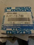 Mazda Part # KJ01-12-740 Nos Engine Timing Belt Idler 1995-2002 Millenia. Fixed Price $60.00.